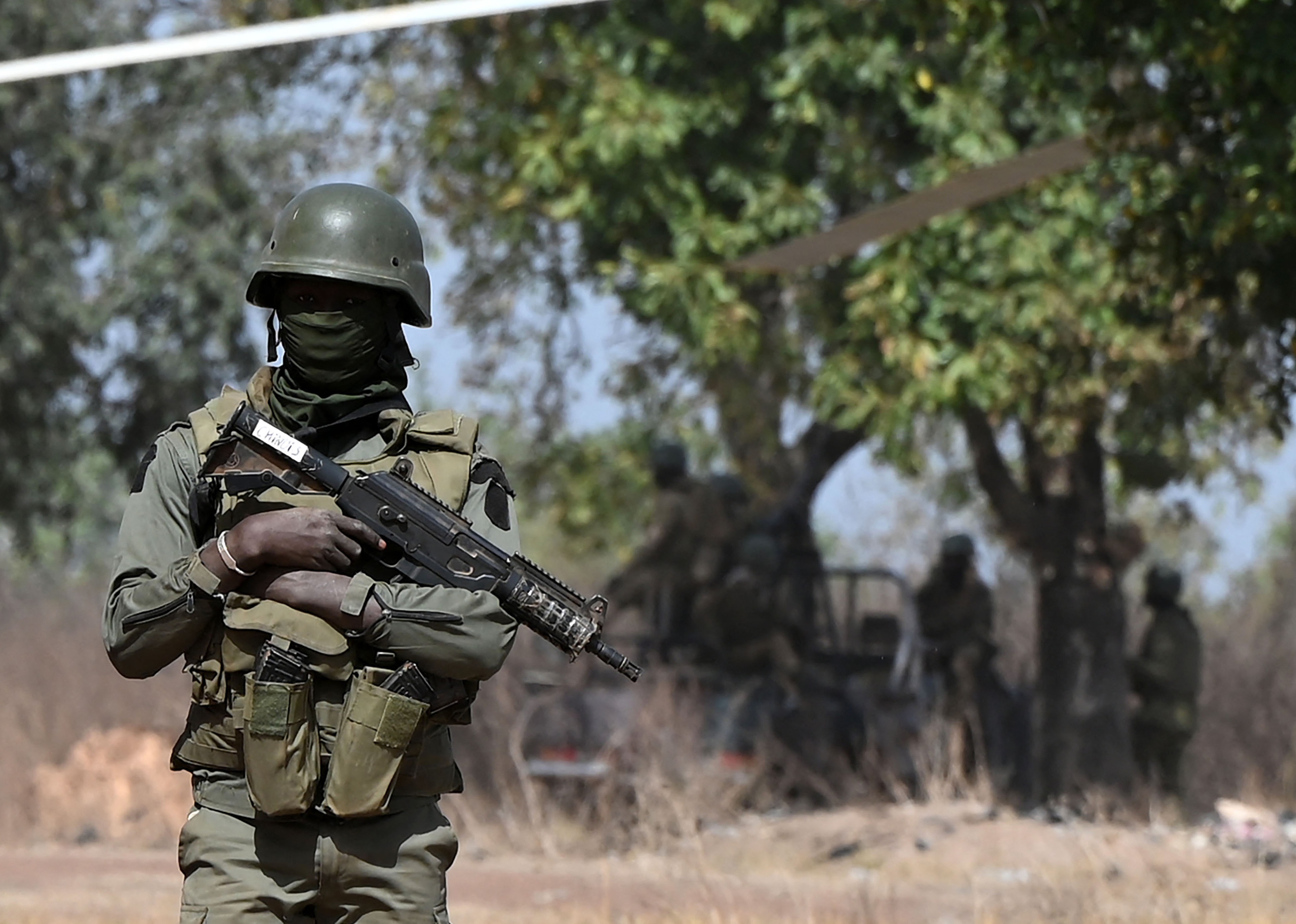 An Ivorian soldier provides security on arrival of Ivorian Prime Minister Patrick Achi.