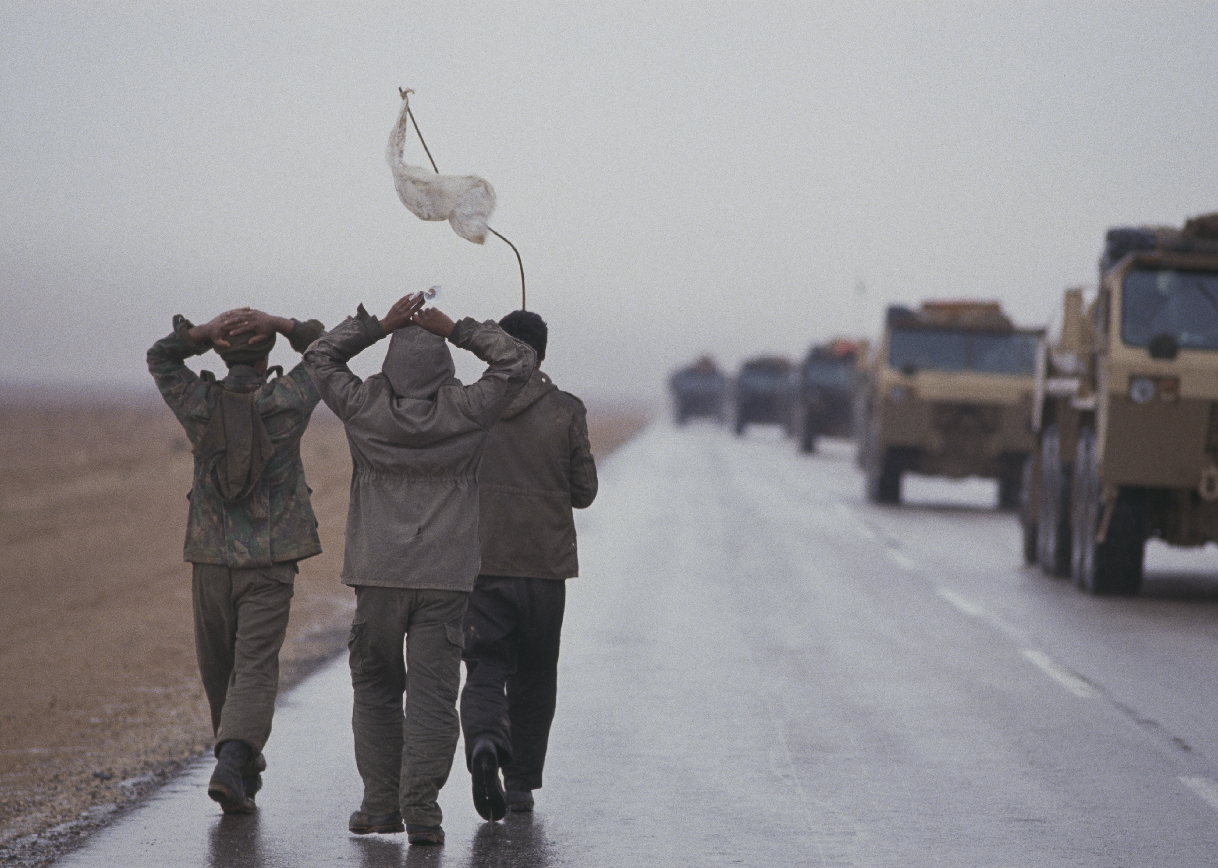 Iraqi prisoners of war surrendering to the United States Army's 6th regiment.