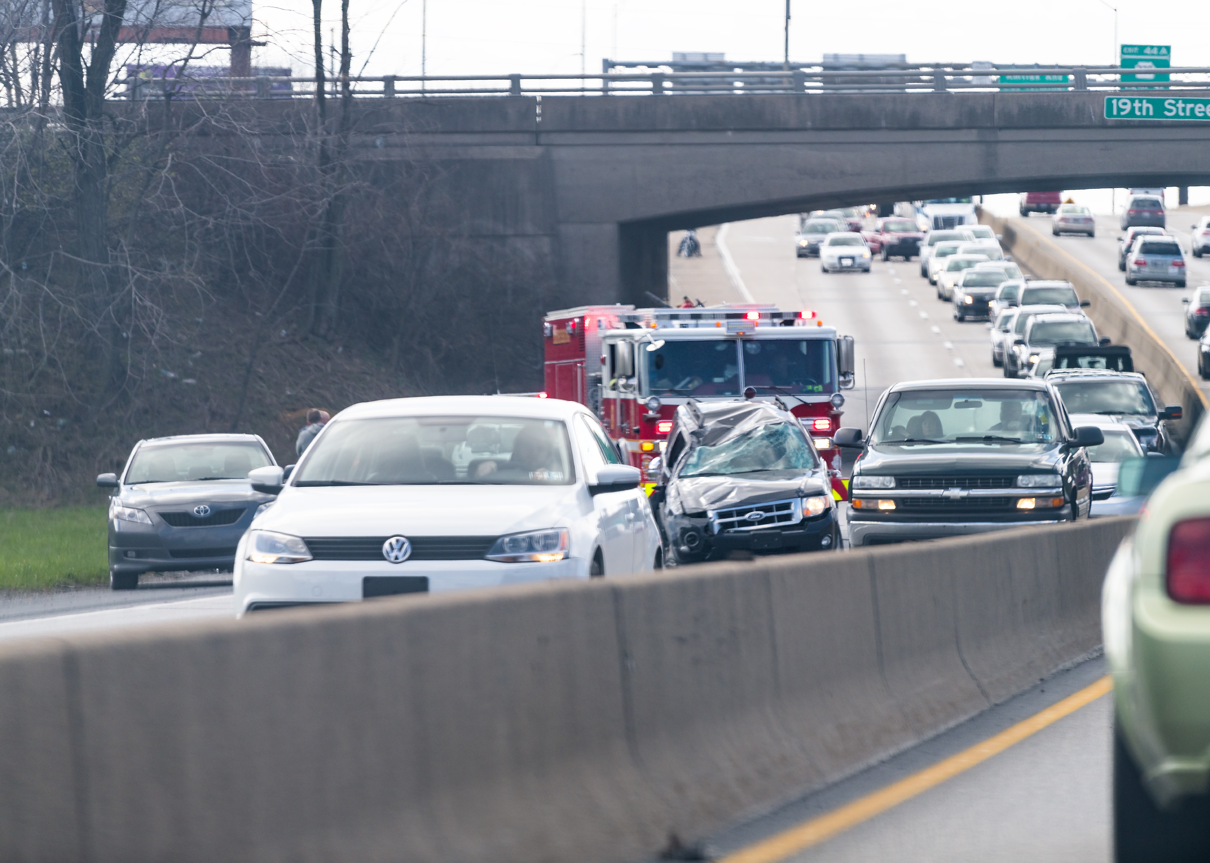 Car accident on interstate highway road 83 with fire engine truck.