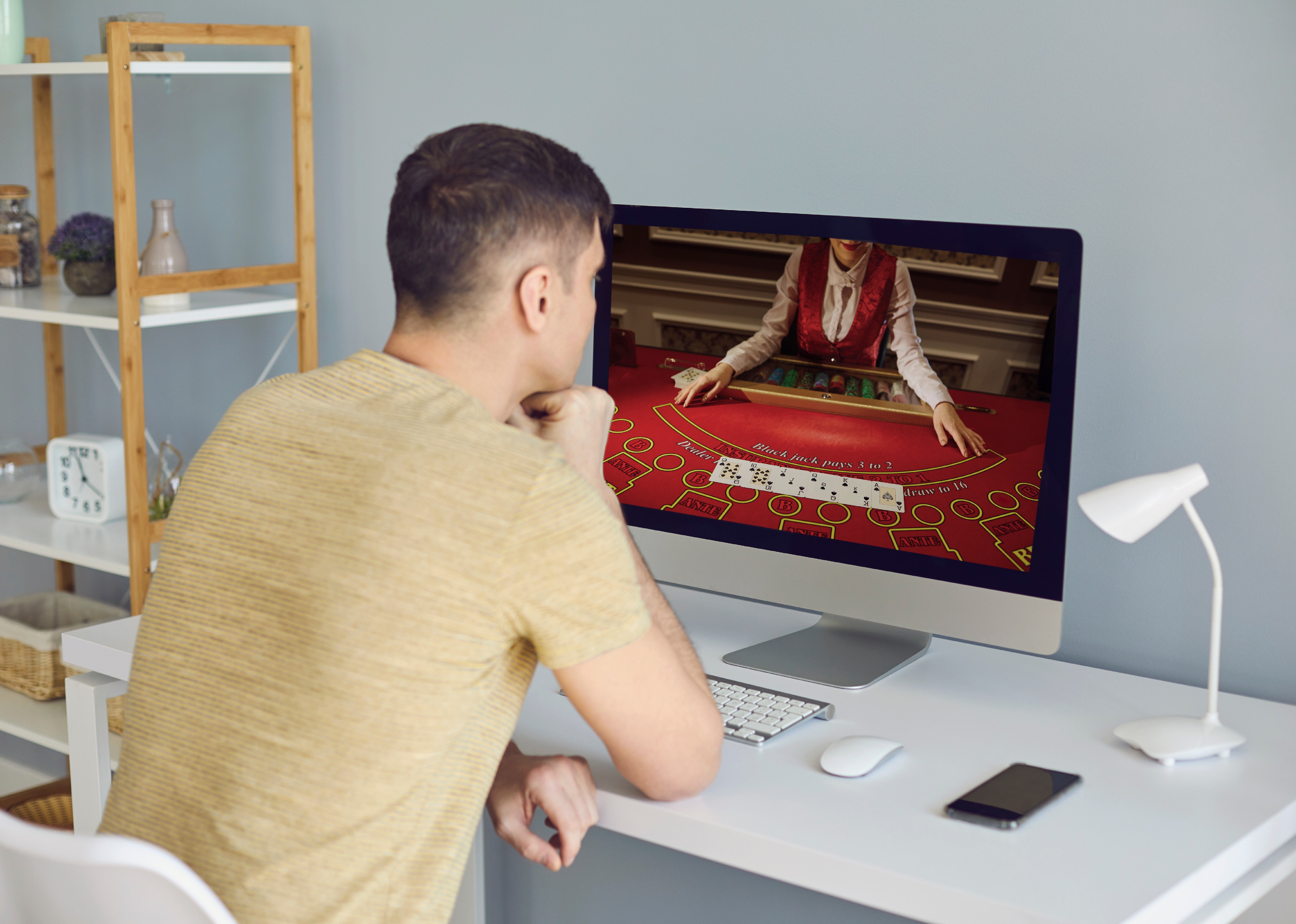 A man makes bets on an online casino,