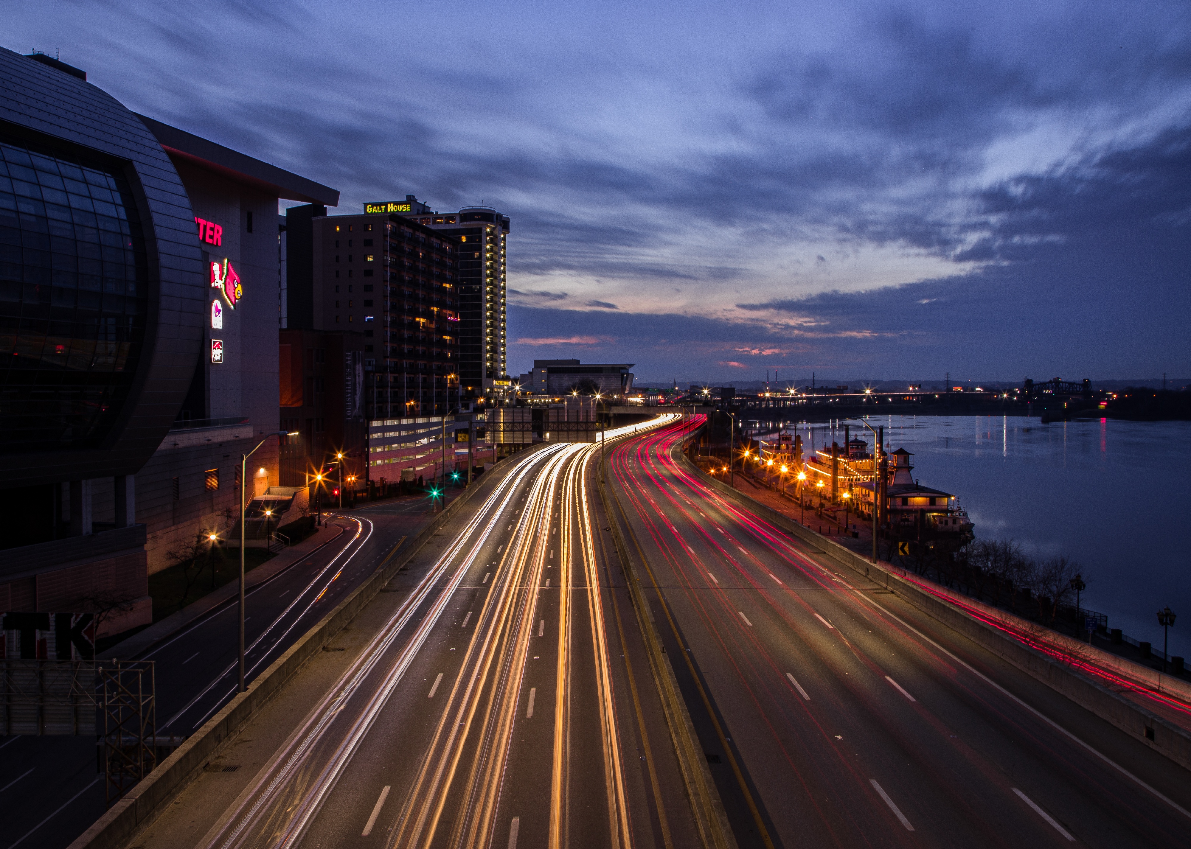 A long exposure shot of car headlights at night on the interstate in Louisville.