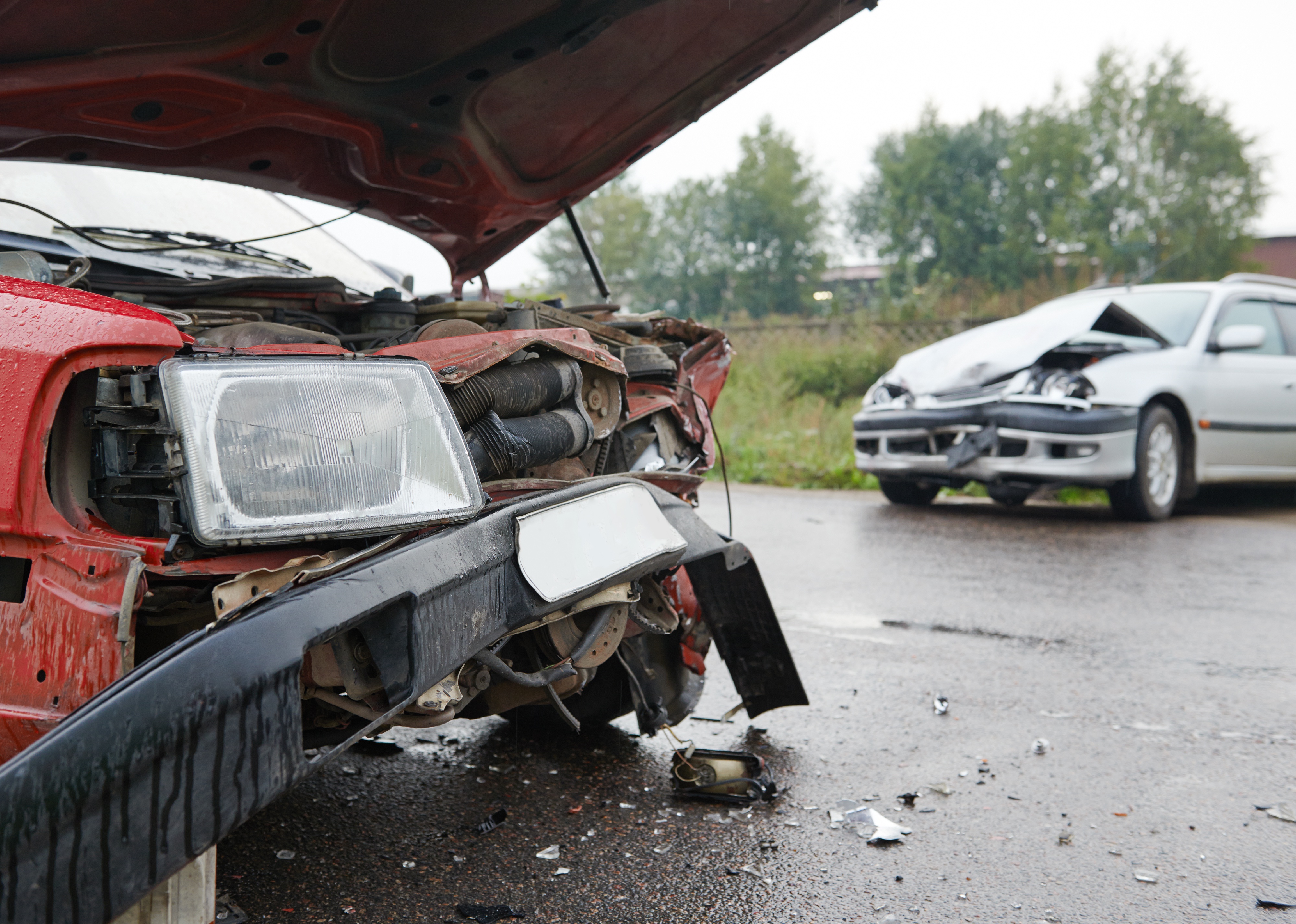 Car crashed and damaged after accident on a road.