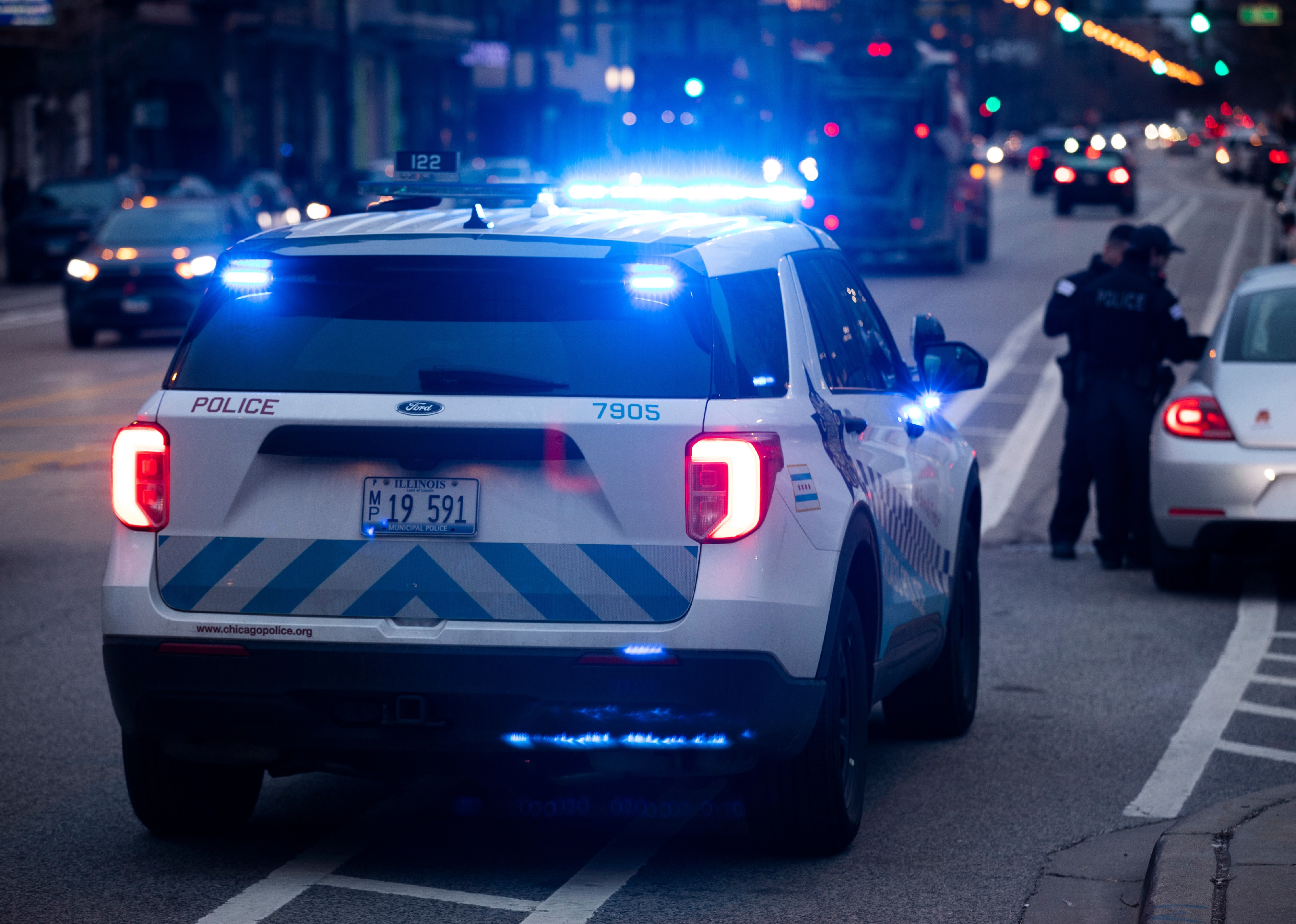 Chicago Police Department officers respond to the scene of an incident.