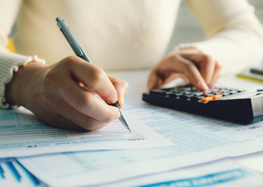 Person filing tax form.