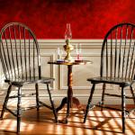 Windsor style chairs and mahogany table.