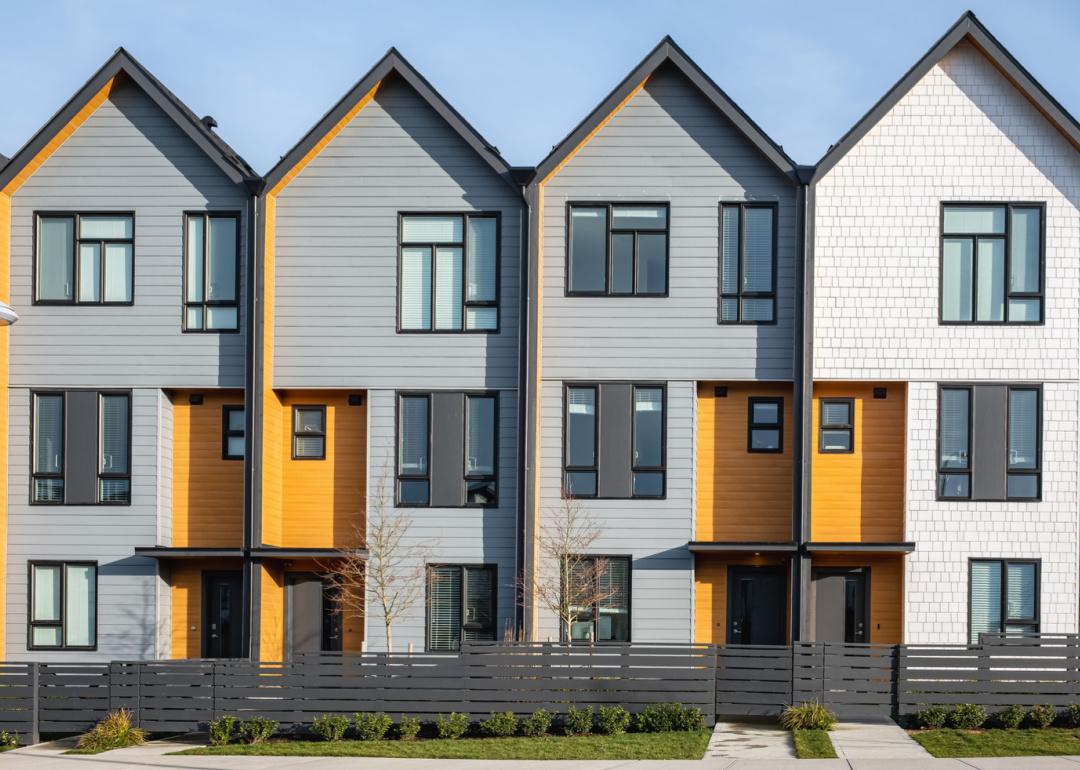 Row of contemporary residential townhouses.