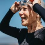 Portrait of smiling healthy mature woman in swimsuit