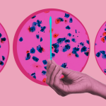 Hand holding test swab with pap test cells in background.