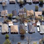 Houses lie flooded from Hurricane Katrina September 11, 2005 in the Gentilly neighborhood of New Orleans, Louisiana. 
