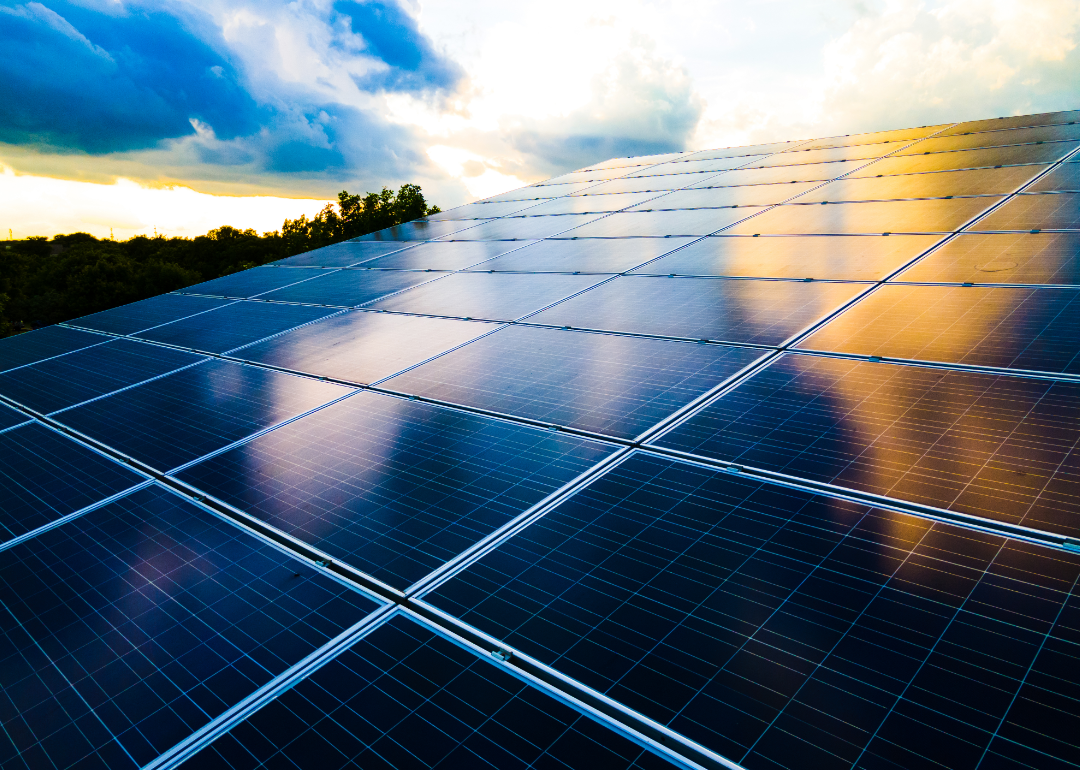 Solar panels lined up on a roof.