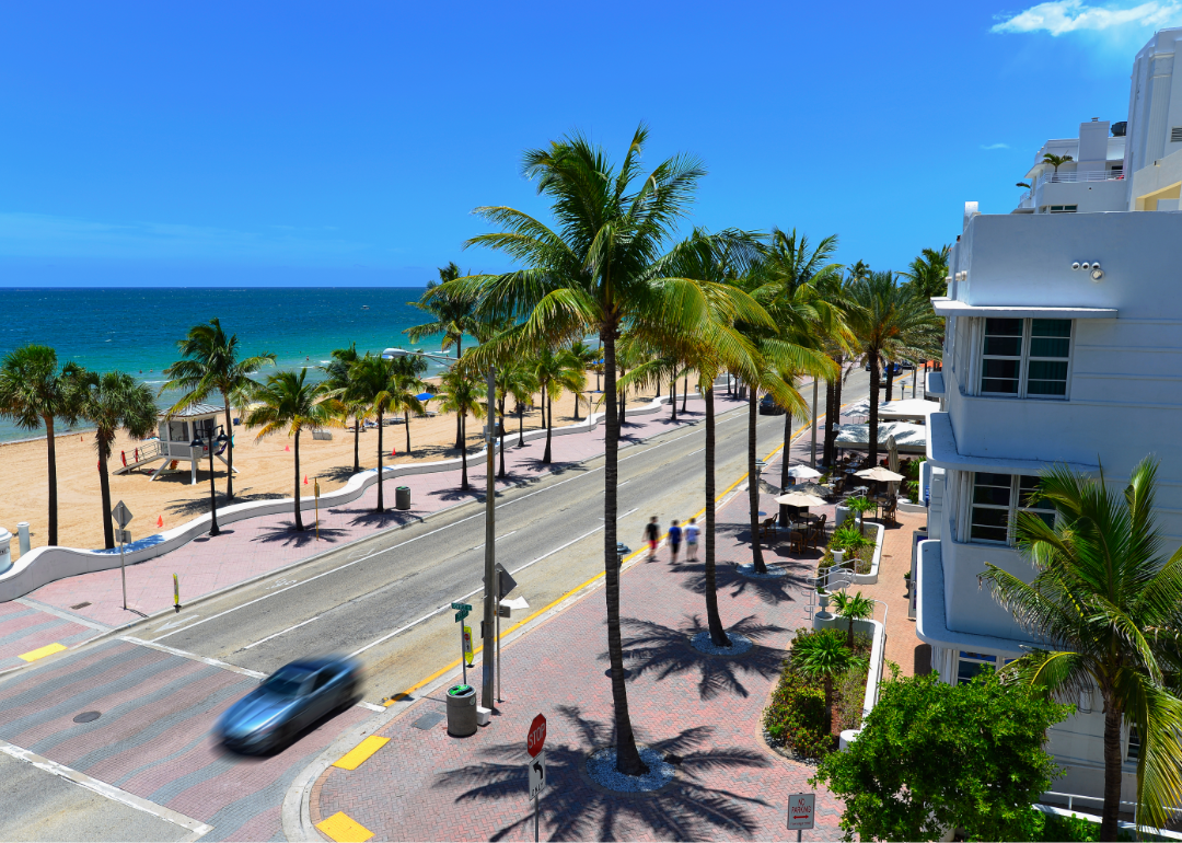 A car driving along the oceanfront in Fort Lauderdale.