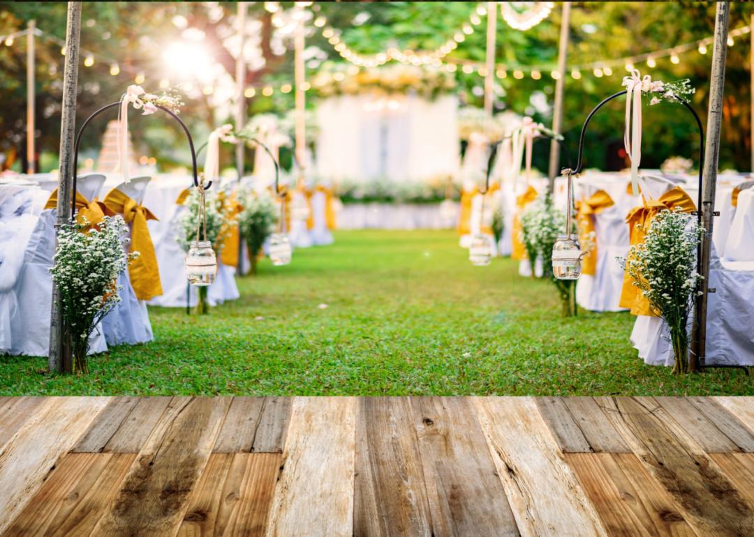 A beautiful setting for a wedding in a garden at sunset.