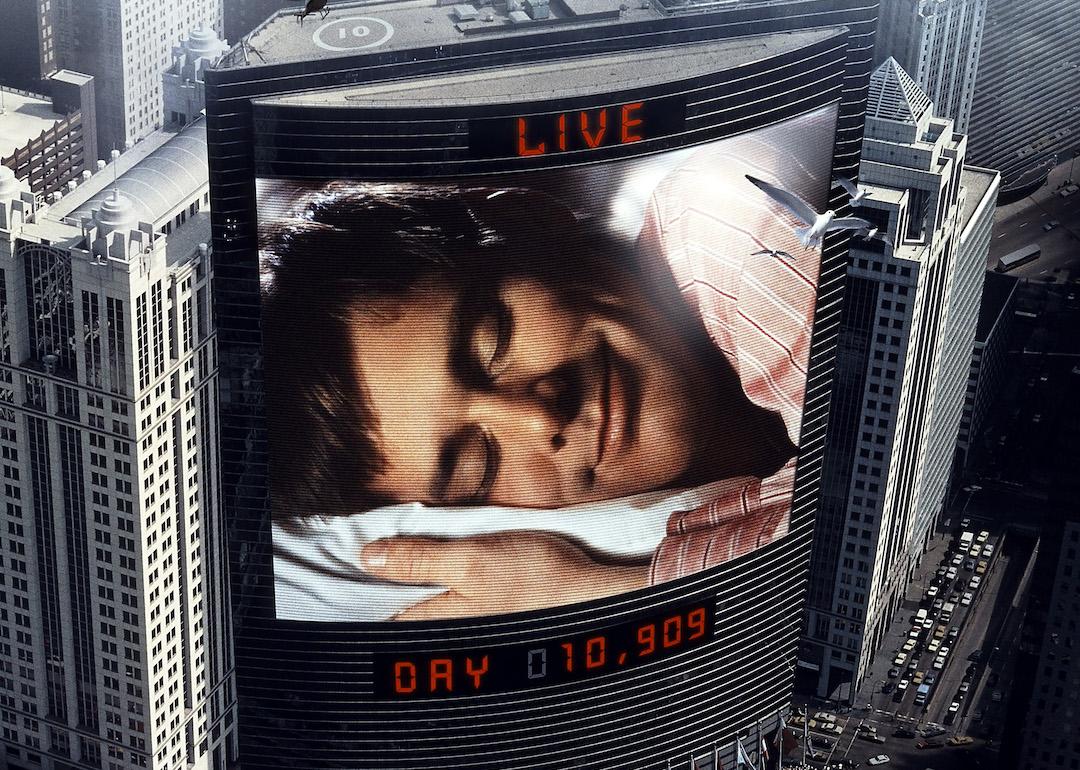 Actor Jim Carrey sleeps in movie art for the 1998 dystopian film 'The Truman Show.'