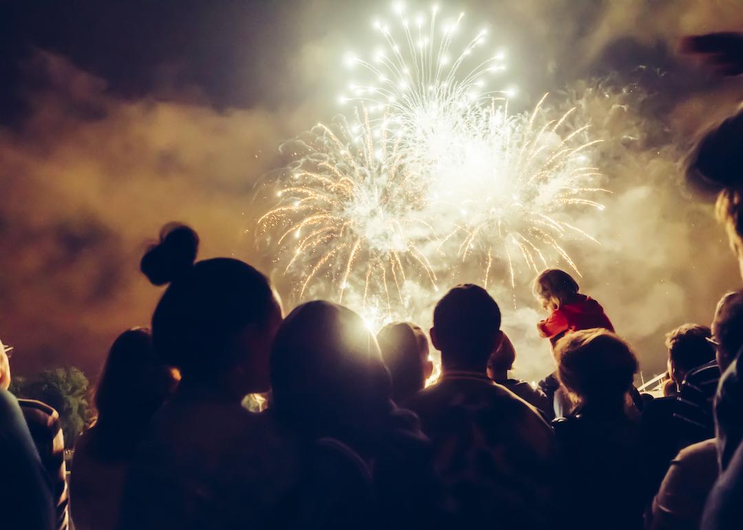 Crowd watching fireworks display on July 4th.
