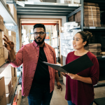 A small business owner talking to a loan officer