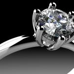 A diamond in the setting of a ring.