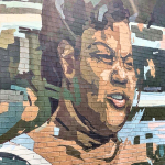 Sarah Mae Flemming mural on the side of a building in Columbia, South Carolina.