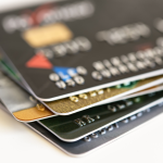 A slightly blurred stack of fanned out credit cards