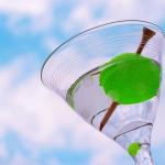 martini with golf tee and ball instead of olive 
