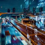 futuristic numbers over freeway, illustrating gathering data from cars on road concept