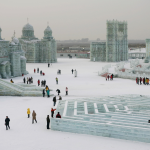 Tourists view ice buildings on display in the Grand Ice and Snow World at 23rd Harbin International Ice and Snow Festival on January 5, 2007 in Harbin, Heilongjiang Province in north China.