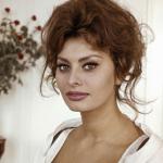 Actor Sophia Loren poses for a portrait in a white dress circa 1960. 