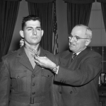 President Truman presents the Medal of Honor to Marine Sgt. Archie Van Winkle of Everett, Washington.