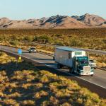 A truck along with other vehicles passing by the I-10 in Arizona.