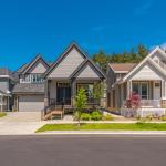 A row of contemporary modern three-bedroom homes.