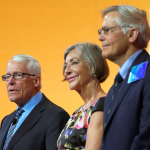 Members of the Walton family (L-R) Rob, Alice and Jim speak during the annual Walmart shareholders meeting event on June 1, 2018 in Fayetteville, Arkansas.