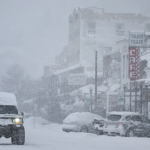  Snow falls downtown, north of Lake Tahoe, during a powerful multiple day winter storm in the Sierra Nevada mountains on March 02, 2024 in Truckee, California.