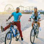 Couple riding bikes in Santa Monica.