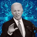 US President Joe Biden delivers remarks in the White House with blue processor graphic in background.