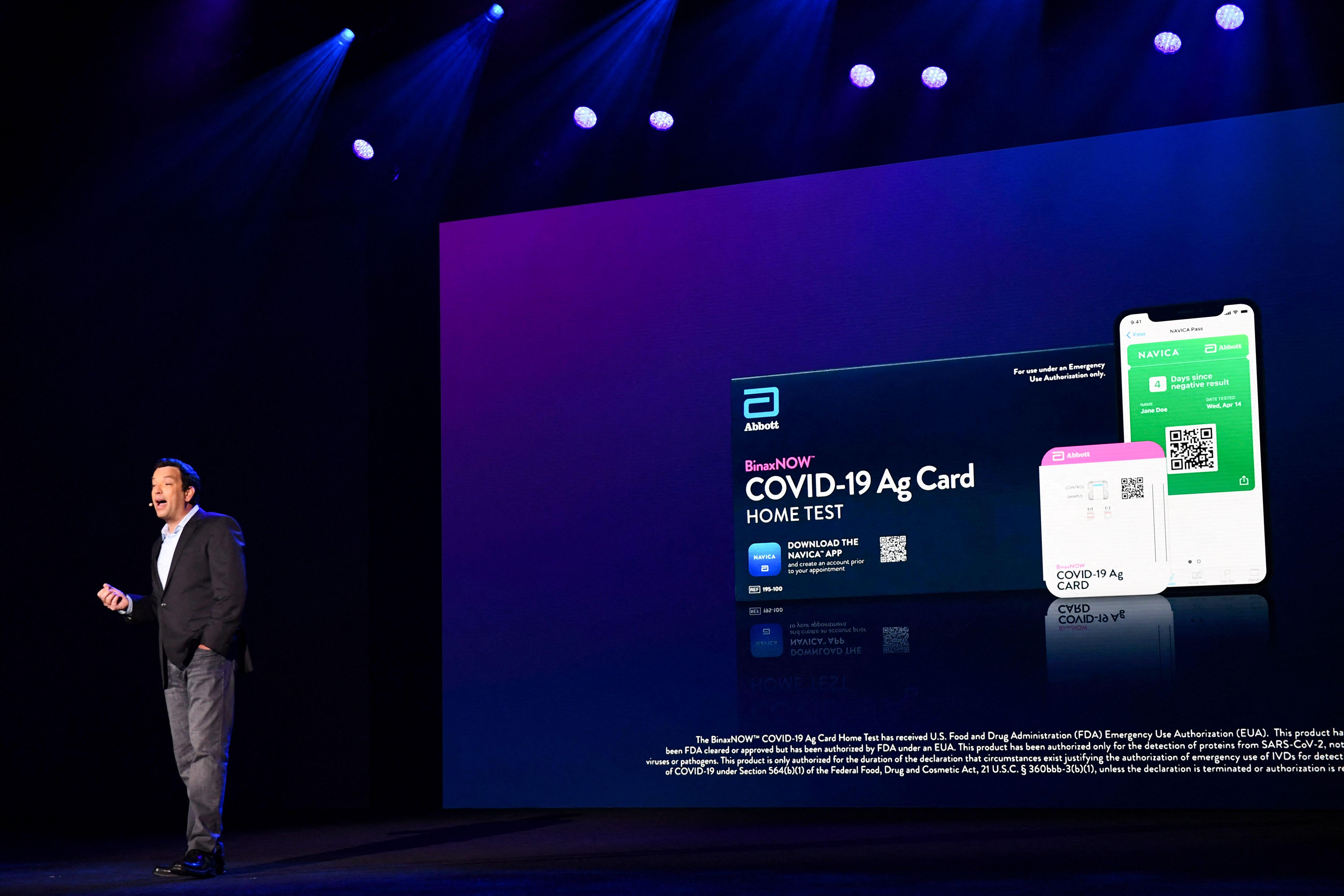 Chief executive officer of Abbott Laboratories speaking on stage.