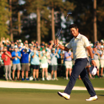 Hideki Matsuyama of Japan celebrates on the 18th green after winning the 2021 Masters.