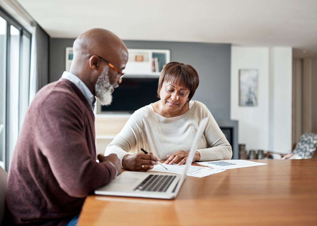 An older couple looking at their retirement finances.
