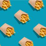 Print of boxes of french fries on a blue background.