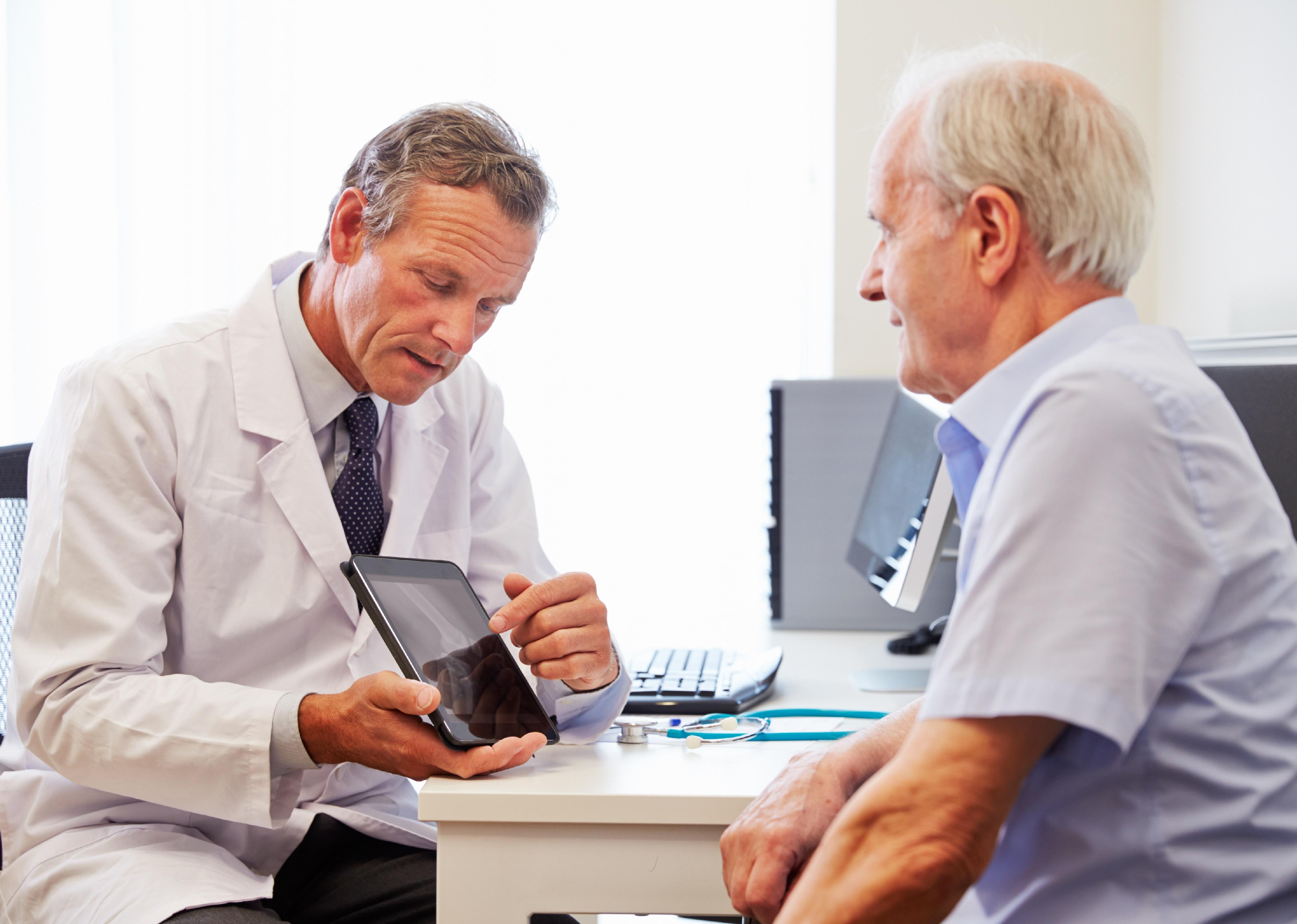 Patient having consultation with doctor in office.