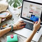 Woman holding credit card online shopping