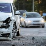 Front of a car damaged by an accident.