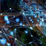 Cars on road during nighttime illustrated with tracking technologies.