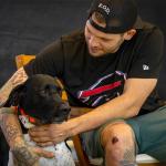 Jacob Schmitt with his dog Buddy, at his home in Ogden, on Thursday, July 31, 2025.