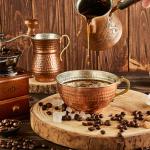 A set of copper coffee set tools.