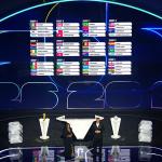 View of stage where the FIFA world cup draw was done, the results are projected showing countries and flags in each group.
