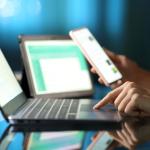 A person on multiple media devices.