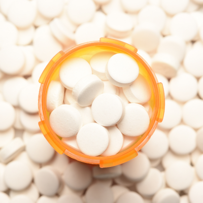 High-angle view of a prescription bottled filled with pills.