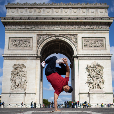 B-boy Mounir of France poses in front of the Arc de Triomphe.