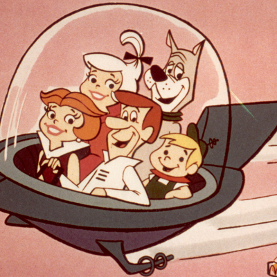 The Jetsons flying in a space car.