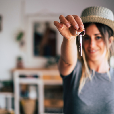 Woman holding house keys