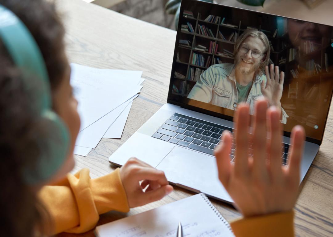 Student studying with online tutor.